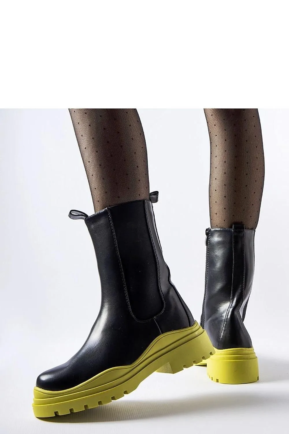 Black ankle boots with a colorful sole