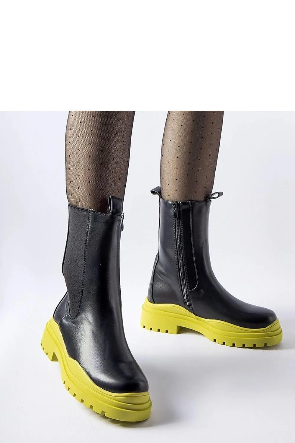 Black ankle boots with a colorful sole